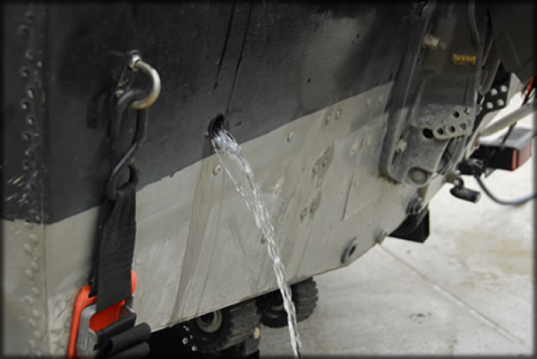 draining water from plug hole